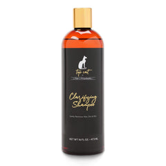 Chris Christensen Top Cat Clarifying Shampoo bottle being poured for a gentle coat refresh