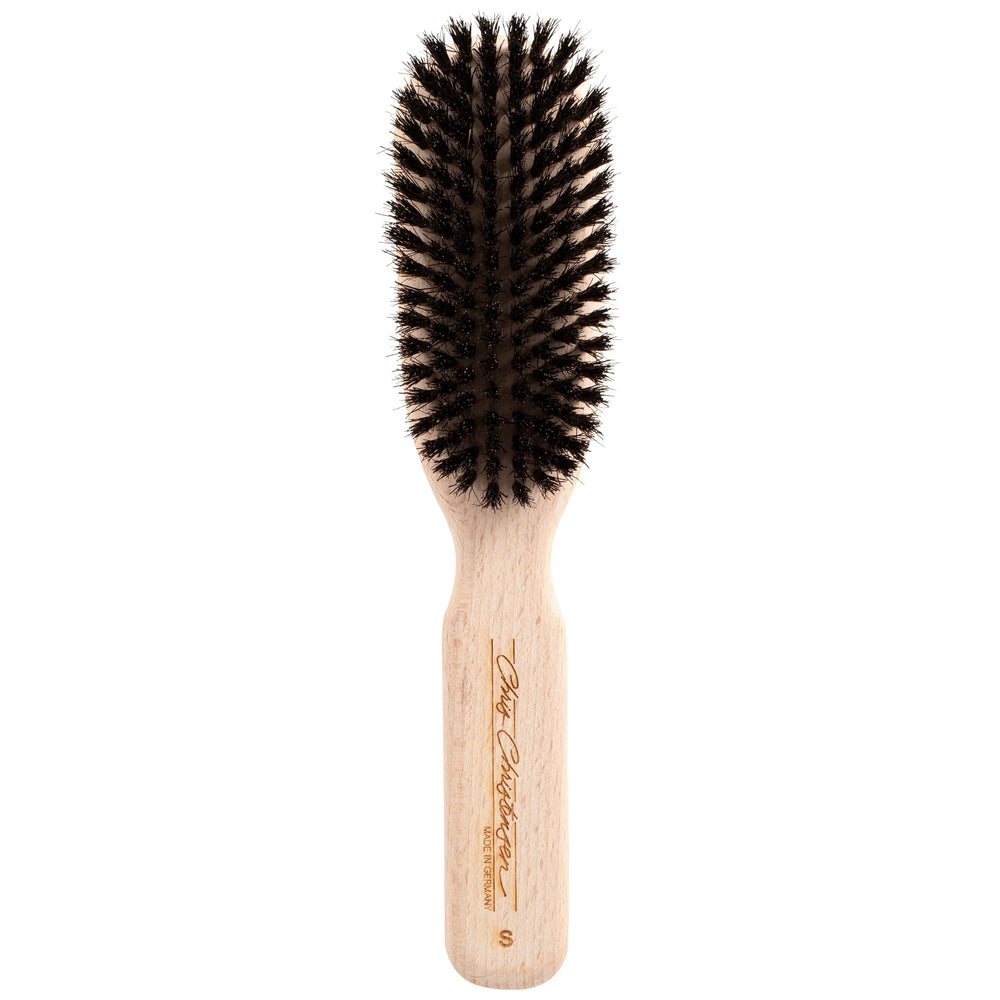 Chris Christensen boar dog brush close-up showing natural boar bristles for coat care