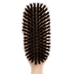 Chris Christensen brush in use during a dog grooming session