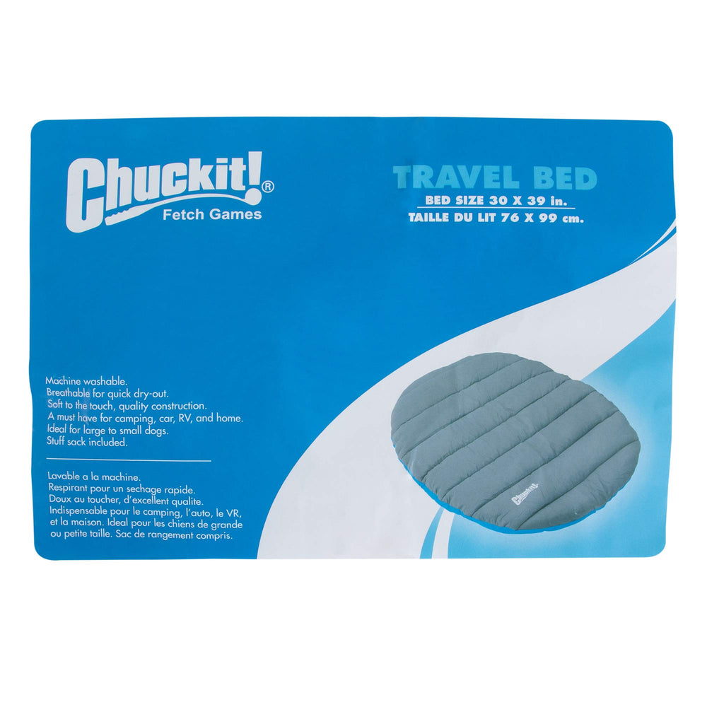 Chuckit! travel dog bed laid out in blue and gray, ready for use on adventures.