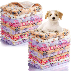 Chumia paw-print dog blanket in soft fleece for cozy use.