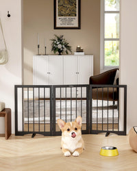 Cideny free standing dog gate setup in doorway for wall-safe containment.
