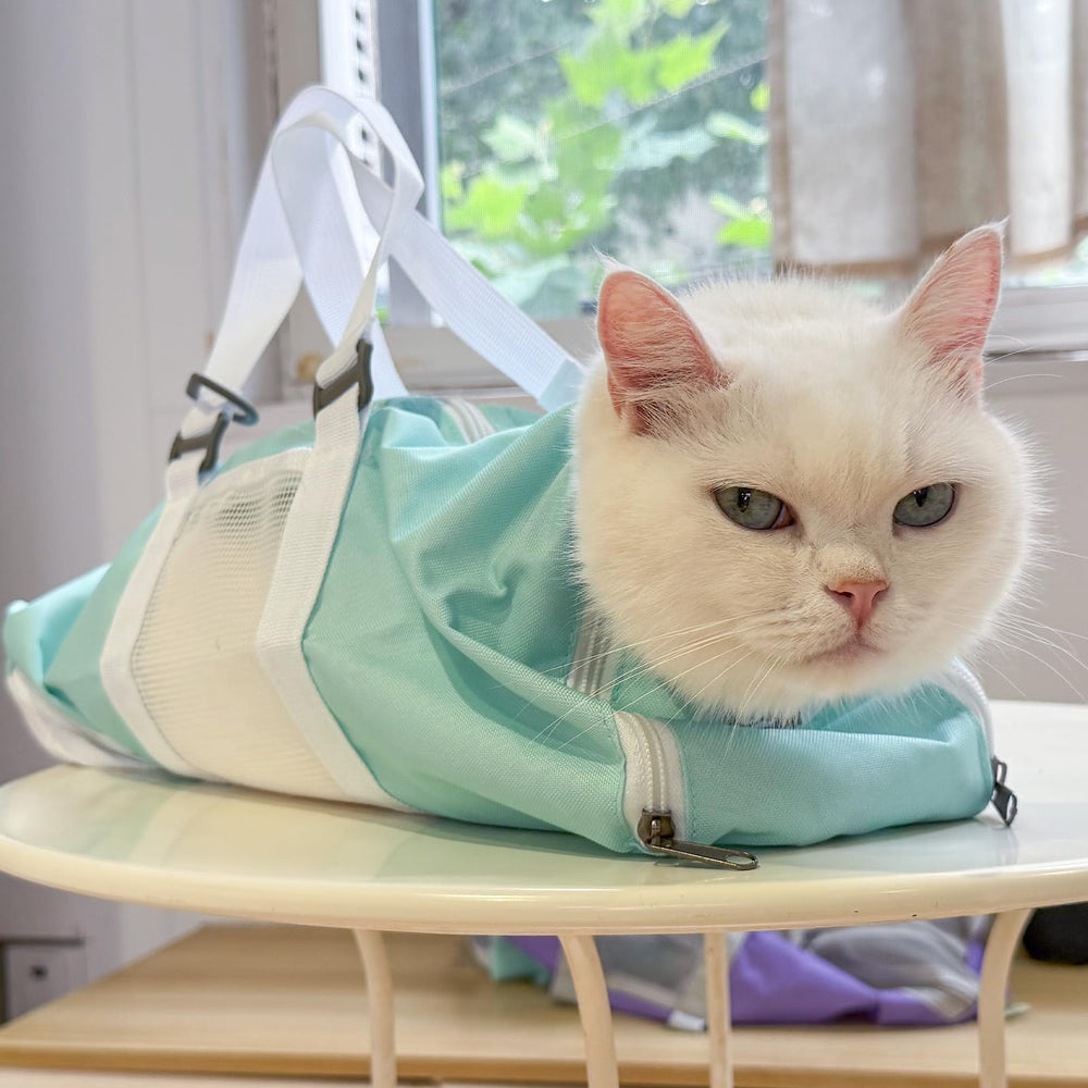 Cinf Cat Grooming Bag breathable mesh keeps kitty cool.