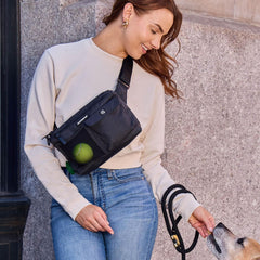 Cleverpup sling bag poop bag dispenser helps tidy trips with your pup.