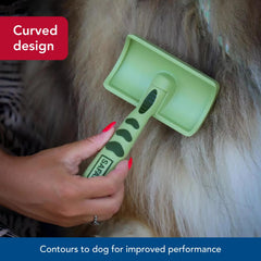 Coastal Safari curved firm slicker brush ergonomic non-slip handle for extended grooming sessions.