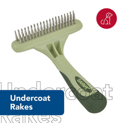 Coastal Safari undercoat rake in use on a dog coat during grooming at home.