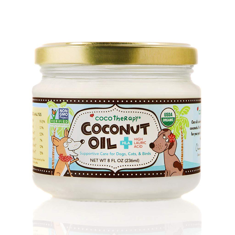 CocoTherapy organic virgin coconut oil bottle pour for dogs supports digestion and coat shine.