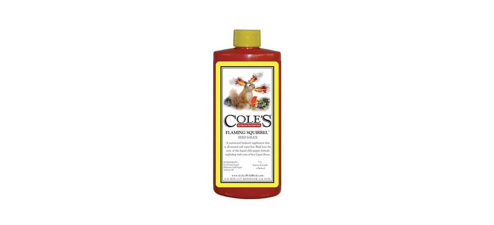 COLE'S FS16 Flaming Squirrel Seed Sauce on mixed seeds attracts backyard birds.