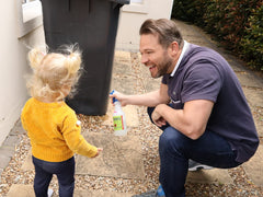 Colton's Naturals cat-repellent-outdoor-spray applied around a trash area.