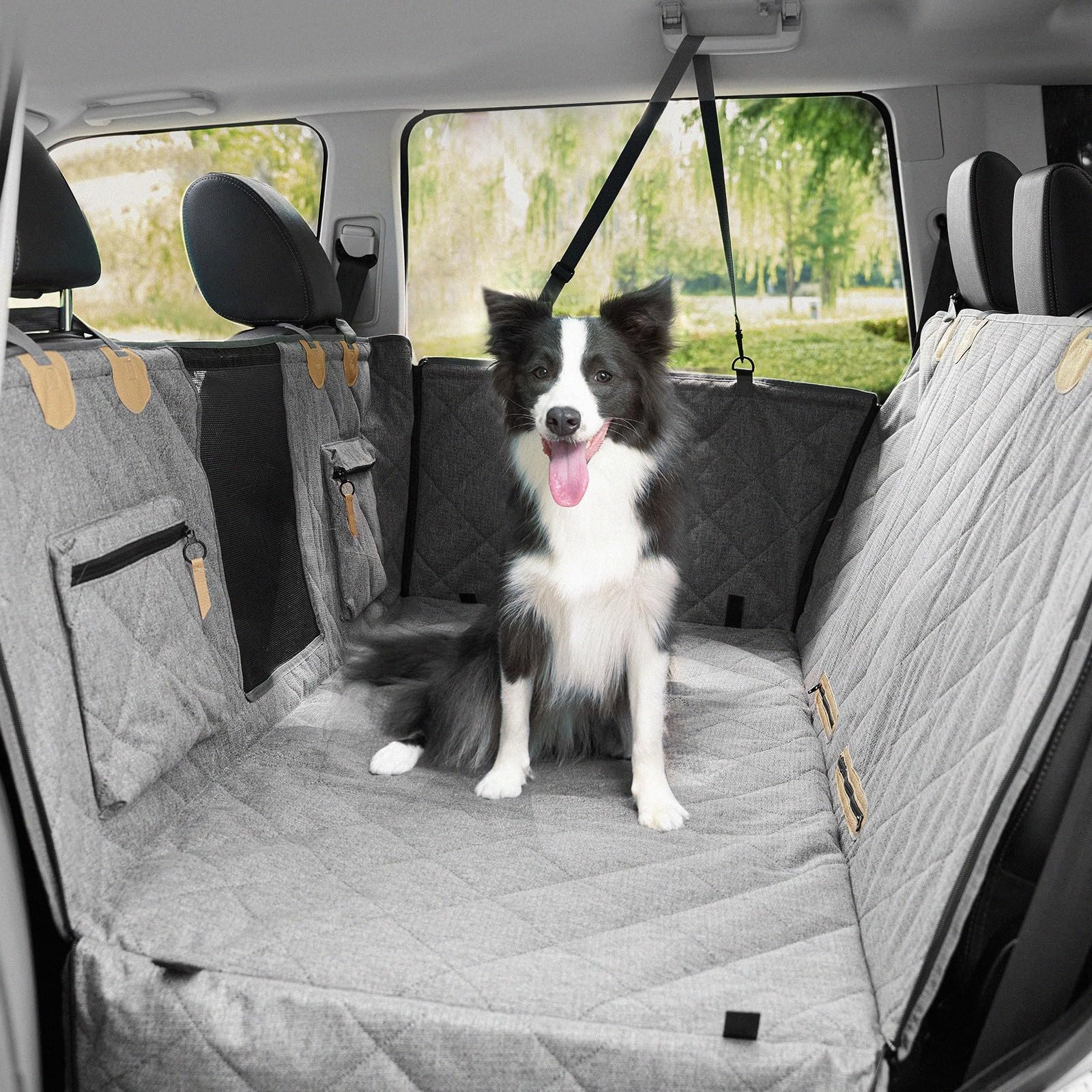 COMPAWNY dog car seat cover in back seat extender mode showing extra space for a comfortable pup
