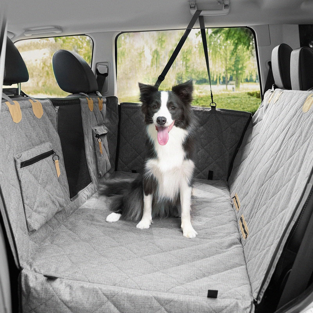 COMPAWNY dog car seat cover in back seat extender mode showing extra space for a comfortable pup