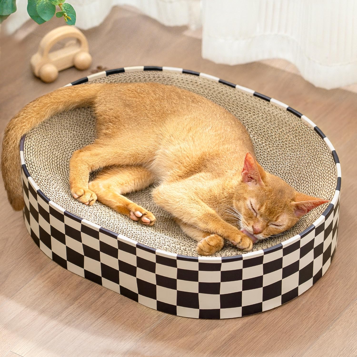 Conlun oval cat scratcher cardboard surface that protects furniture