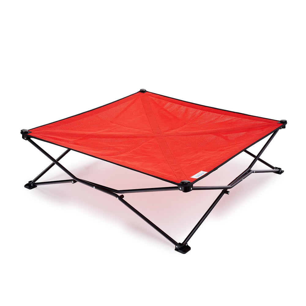 Coolaroo On-The-Go Bed in pop-up setup for quick outdoor rest.