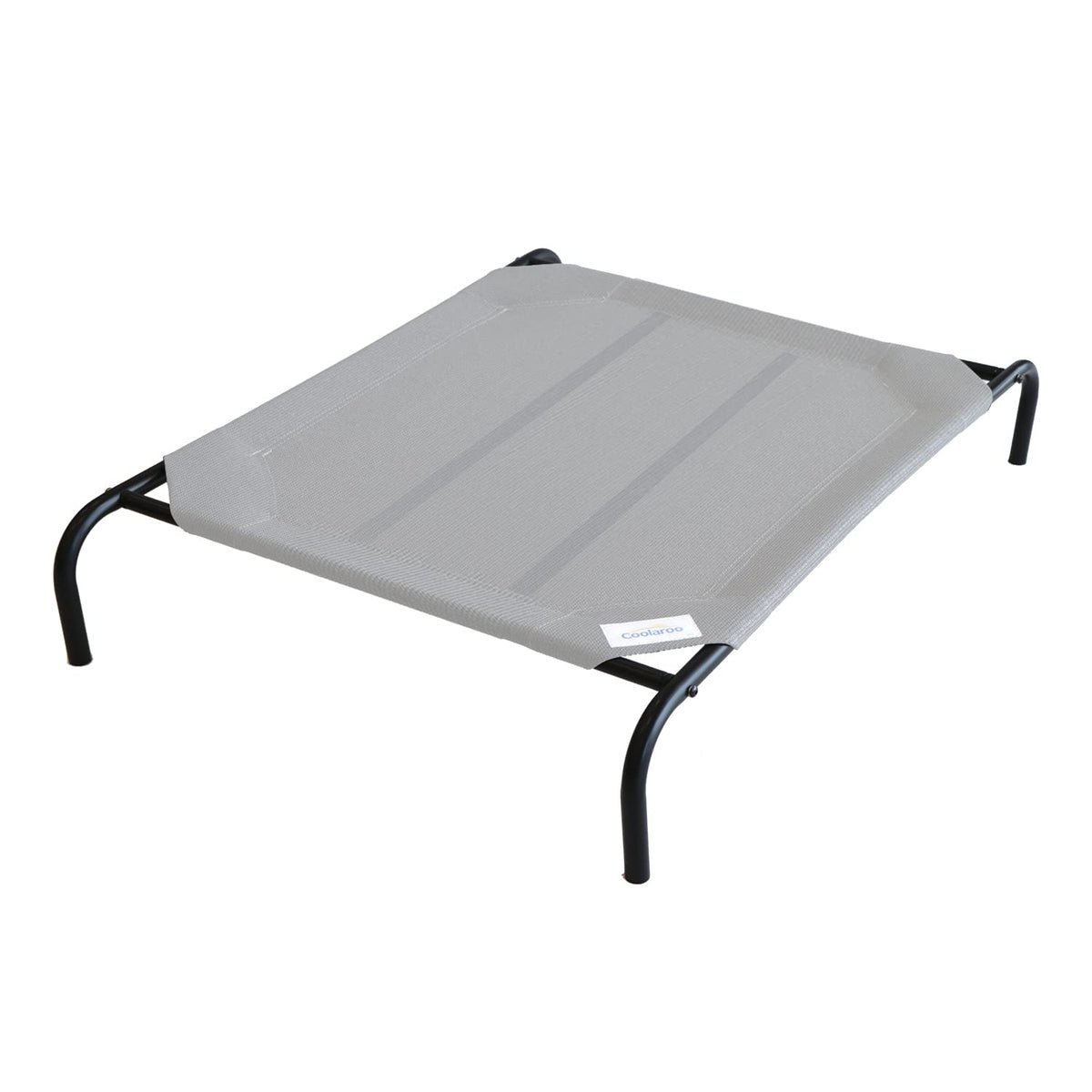 Coolaroo Original Elevated Dog Bed on patio showing cooling airflow for comfortable outdoor lounging.