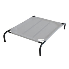 Coolaroo Original Elevated Dog Bed on patio showing cooling airflow for comfortable outdoor lounging.