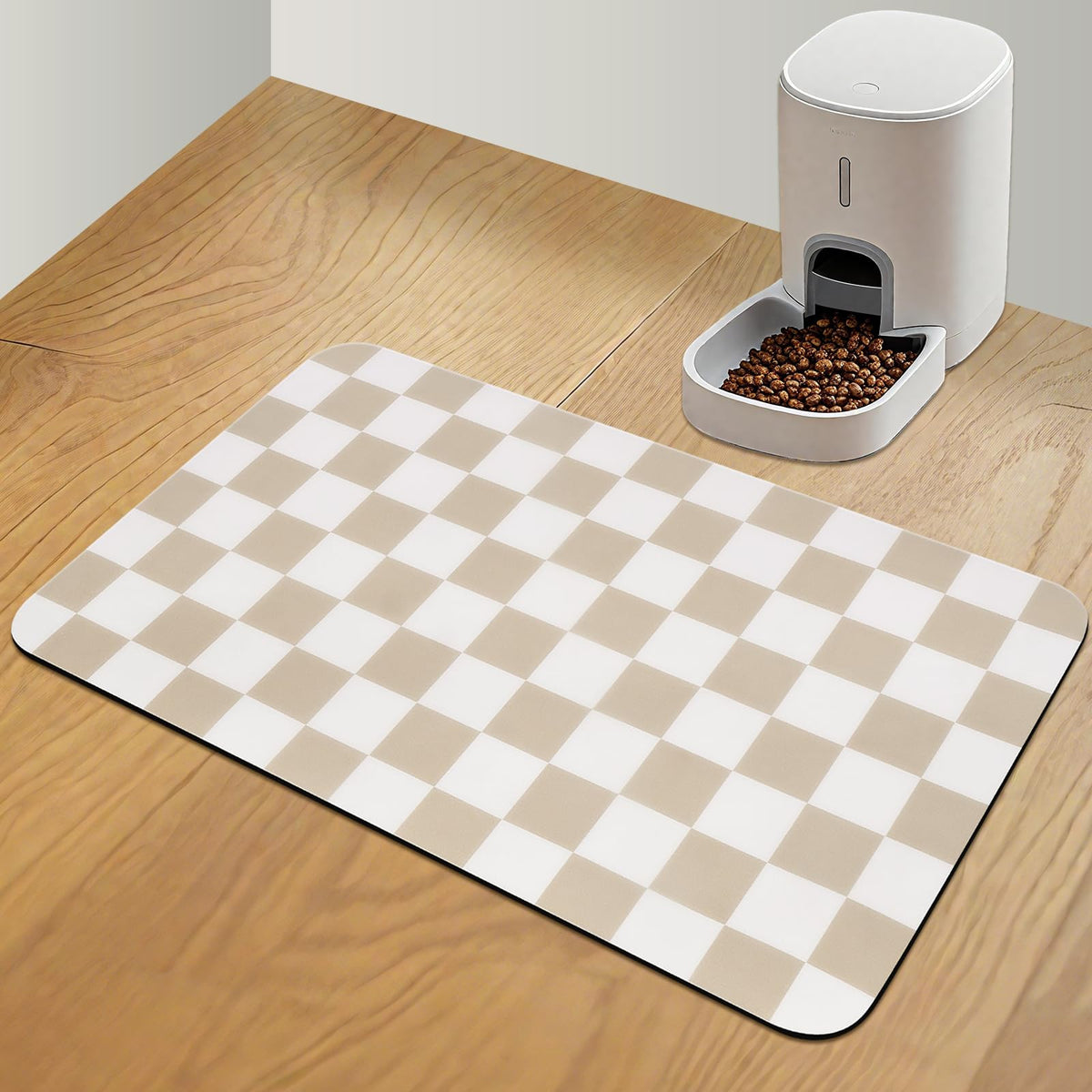 CooRug checkered mat with absorbent surface captures spills for a cleaner feeding space.