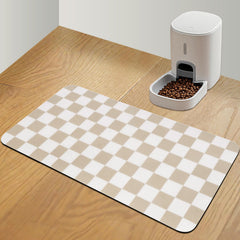 CooRug checkered dog food mat under bowls for a tidy feeding area