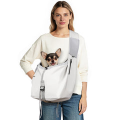 Creproly dog carrier sling with side pockets for quick access.