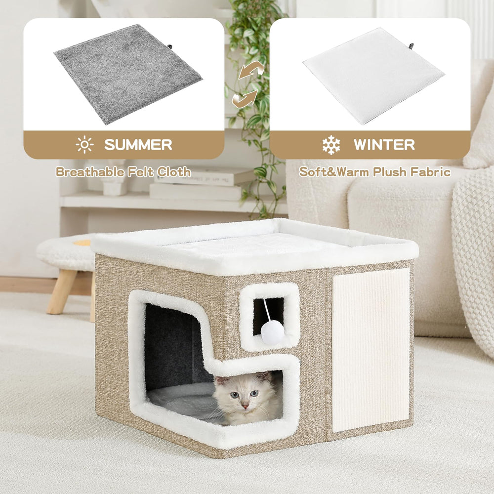 Crispedia cat cave bed with plush hanging ball for interactive play.