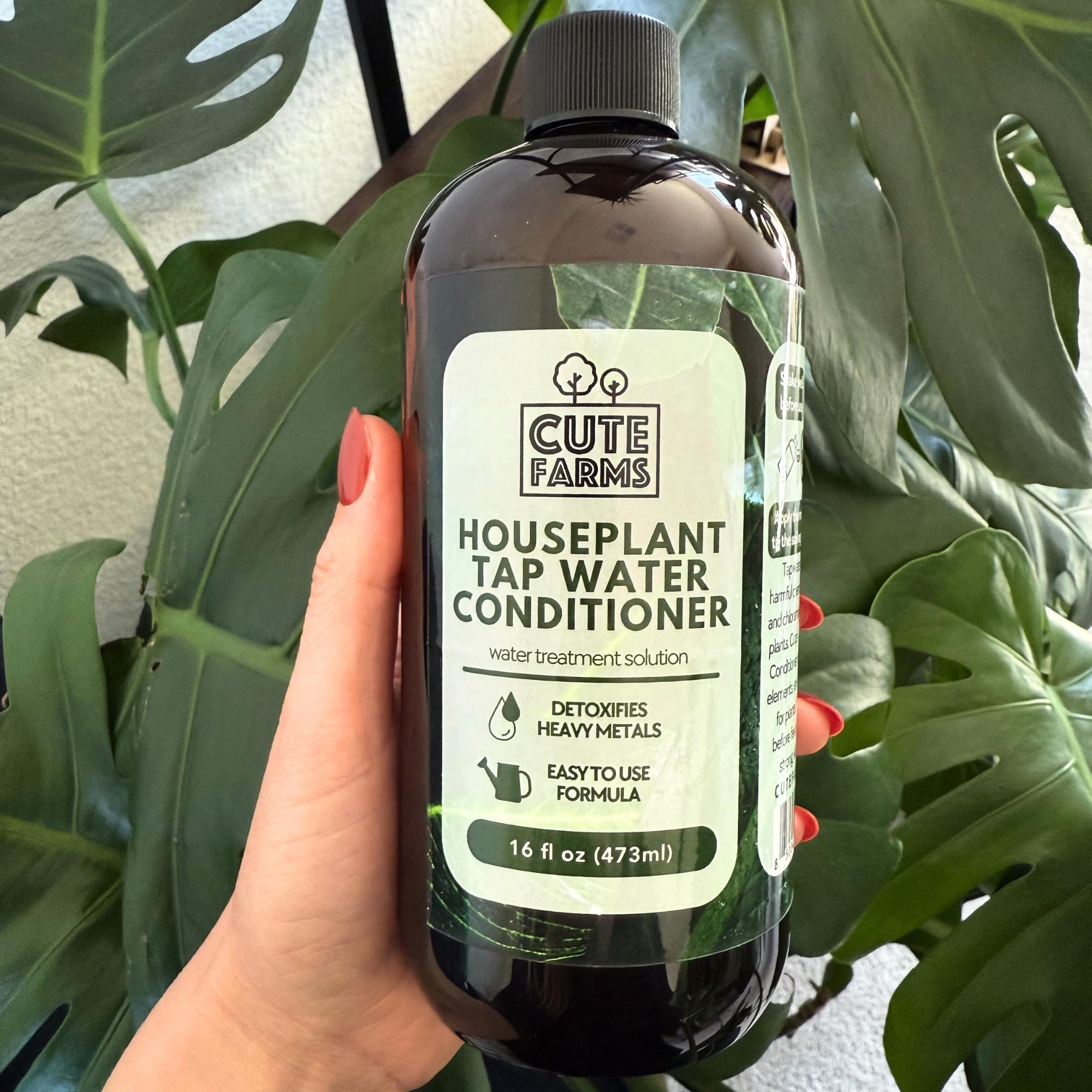 Cute Farms in use watering plants with reduced chlorine exposure