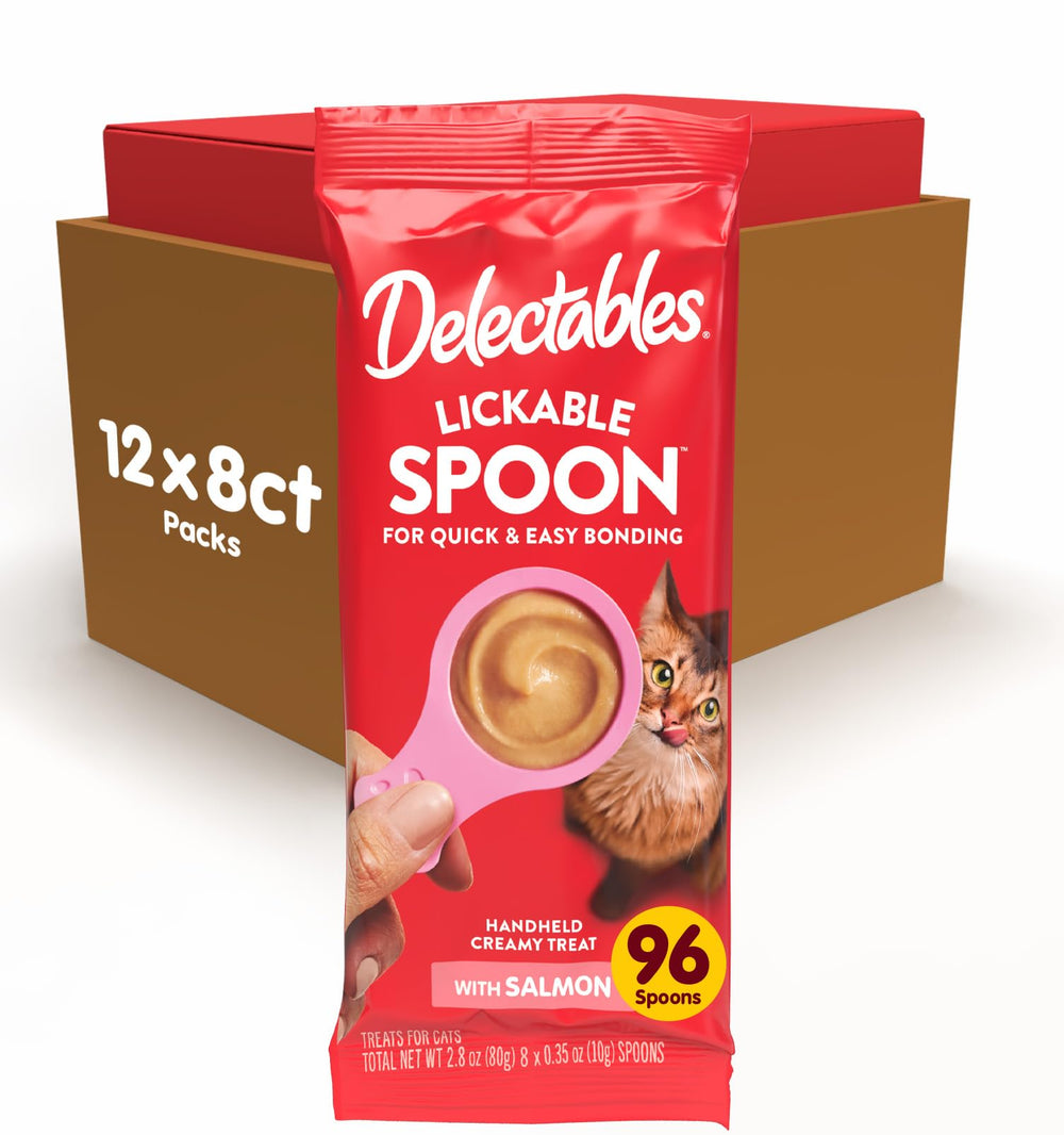 Delectables Lickable Spoon salmon handheld close-up for mess-free bonding with your cat
