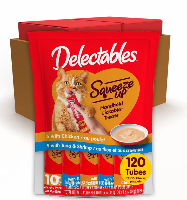 Delectables Squeeze Up handheld cat treat for convenient bonding.