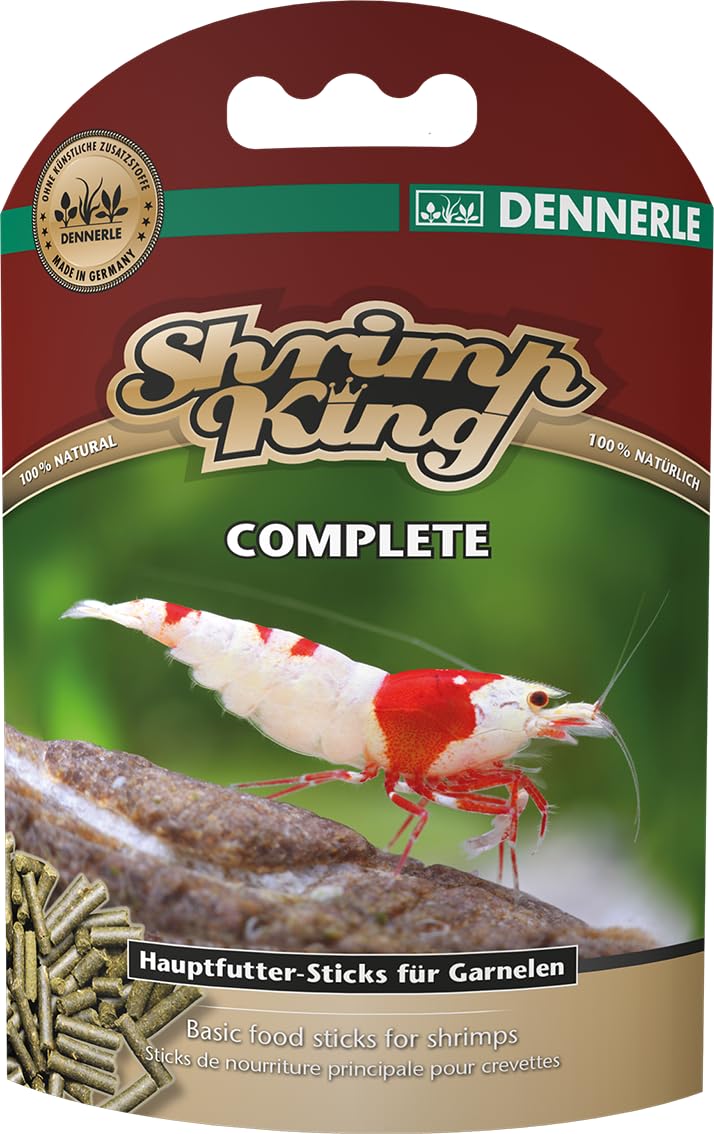 Dennerle Shrimp King Complete sticks sinking in a freshwater tank, supporting balanced growth.