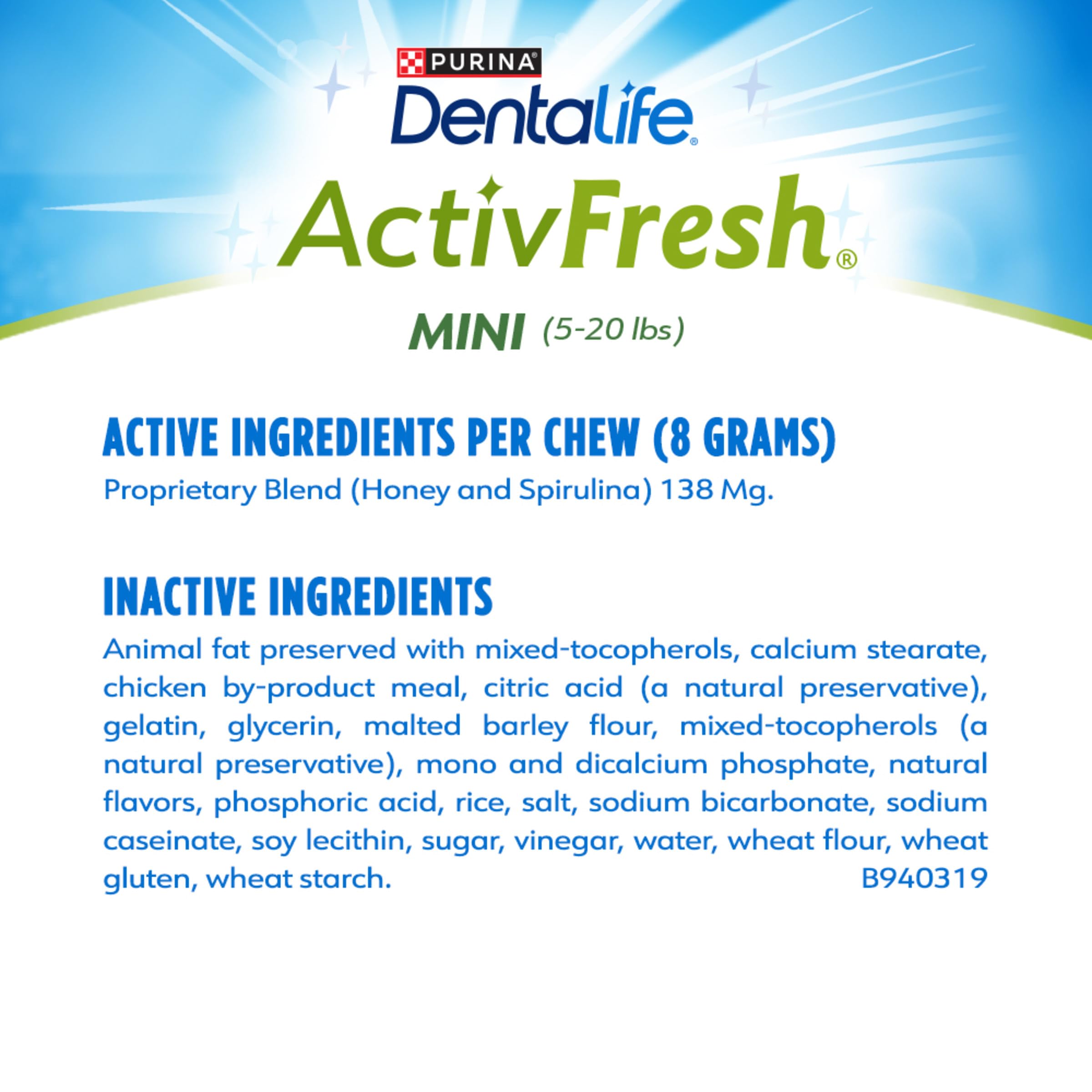 DentalLife ActivFresh dog enjoying chews during feeding time in the kitchen.