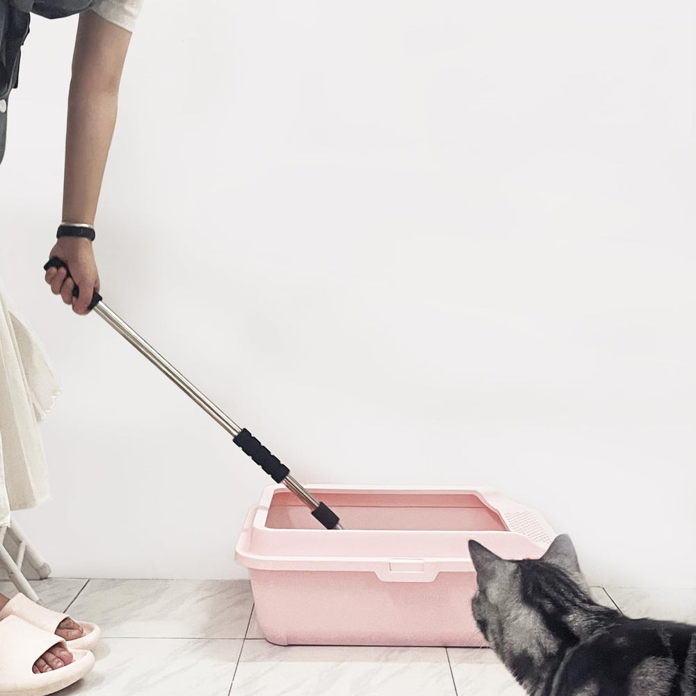 Depets cat litter scoop showing detachable handle for adjustable reach.