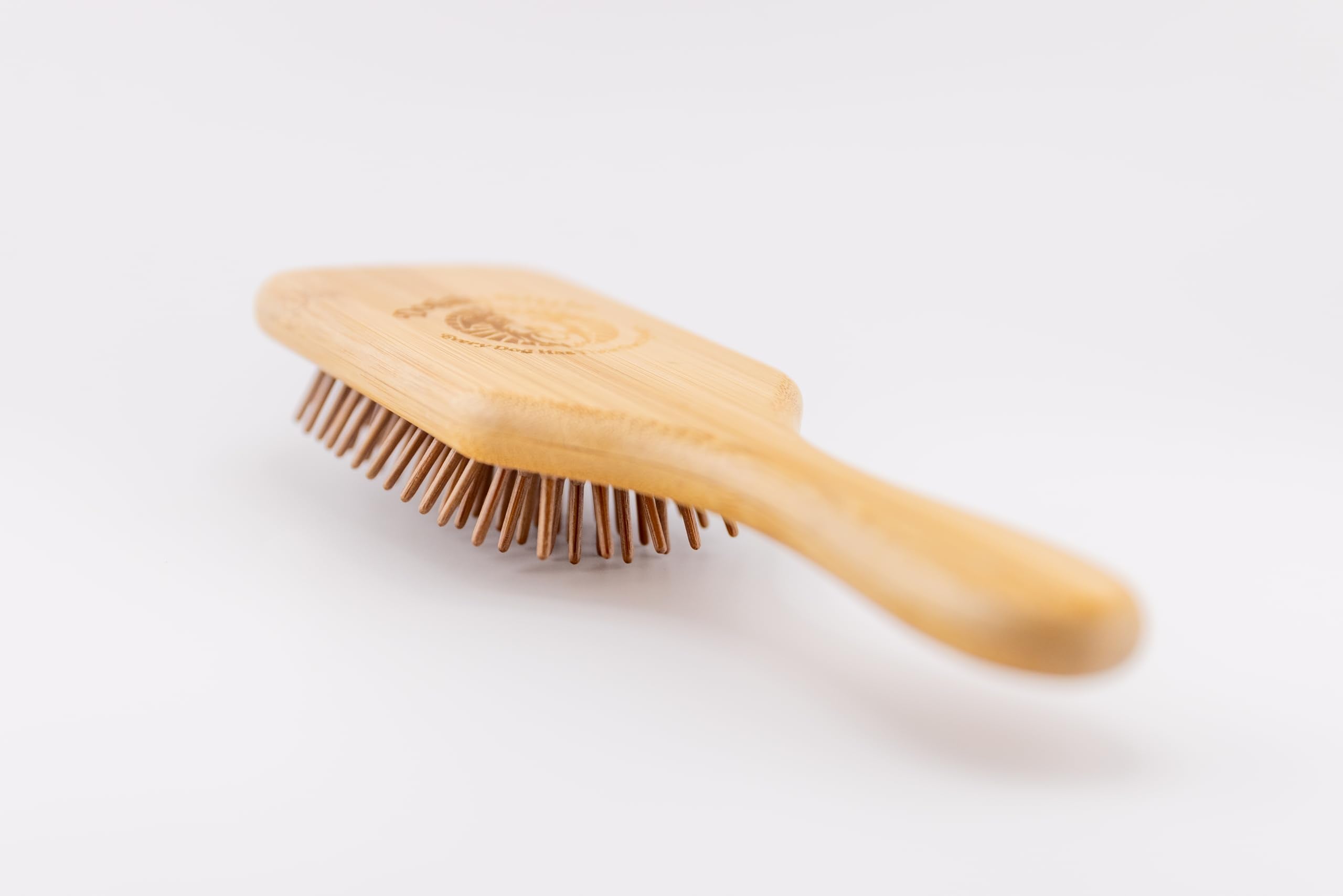 Doggy Style Small Bamboo Dog Brush bath-time use captures easy rinse and cleanup.