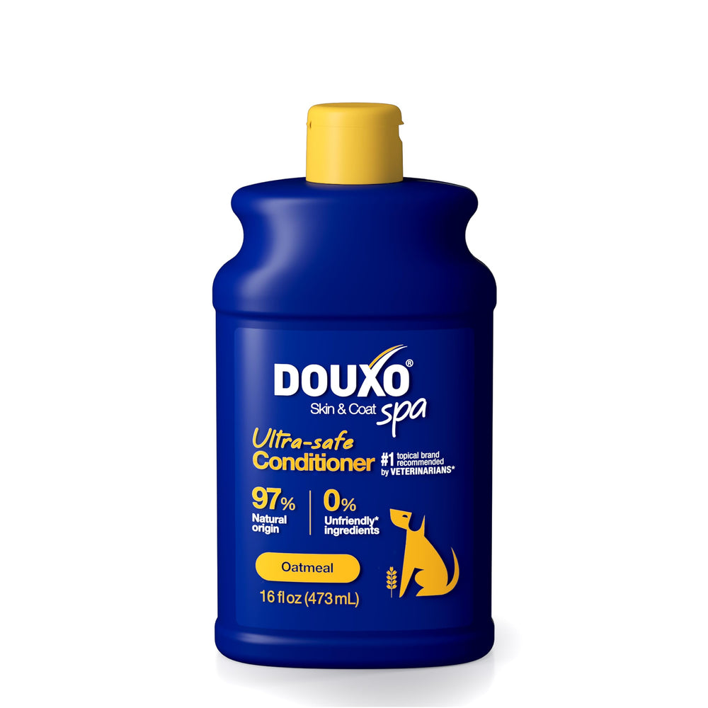 DOUXO Skin and Coat SPA oatmeal conditioner bottle highlighting ultra-safe formula for dogs