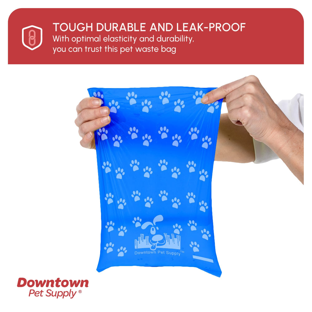 Bone-shaped dispenser clips to leash or belt loop for easy bag access.