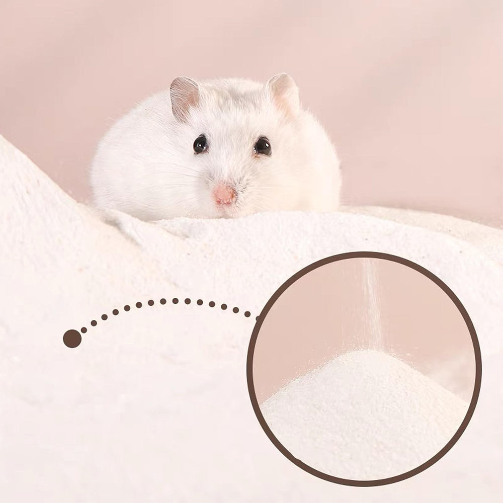 Sand being dispensed into a hamster bath area for play