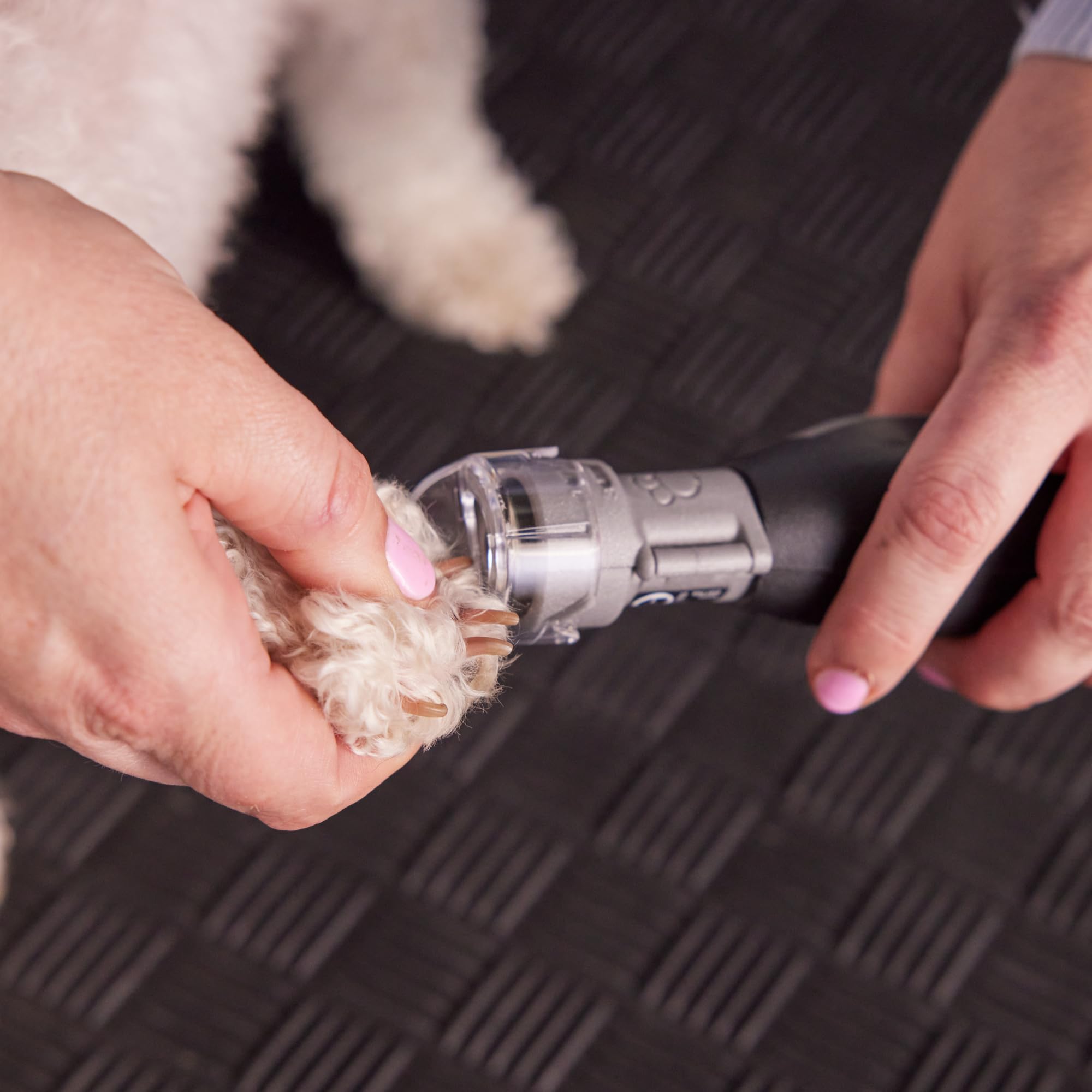 Dremel Nail Guard hinge design for easy cleaning after grooming.