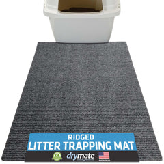 Drymate cat litter mat with ridged design traps litter and protects floors.
