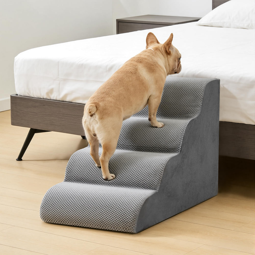 DUMOS dog stairs with a non-slip bottom for secure placement.