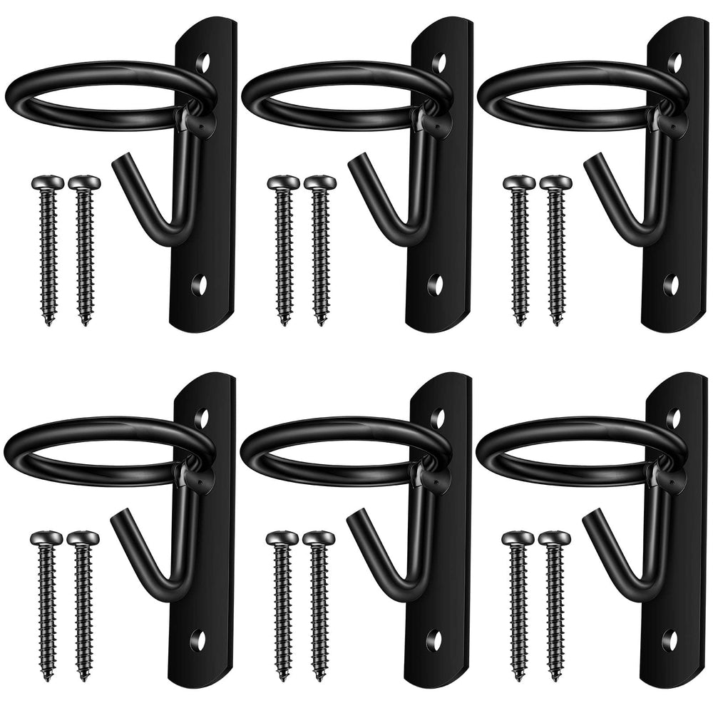 Dunzy bucket hooks in use for hanging a water bucket in a horse stall.