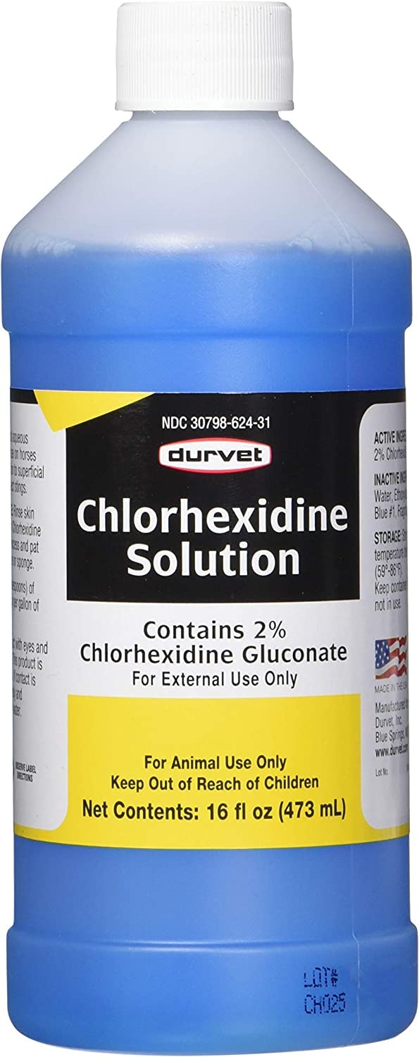 Durvet chlorhexidine solution bottle pour shows gentle wound cleansing on pets.