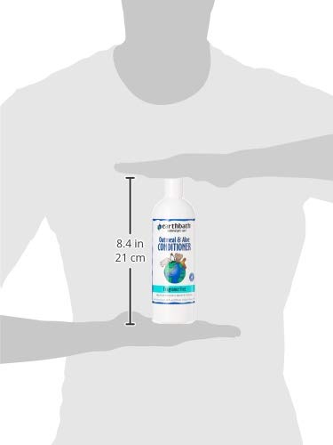 Application of Earthbath colloidal oatmeal conditioner shows easy detangling and coat care.