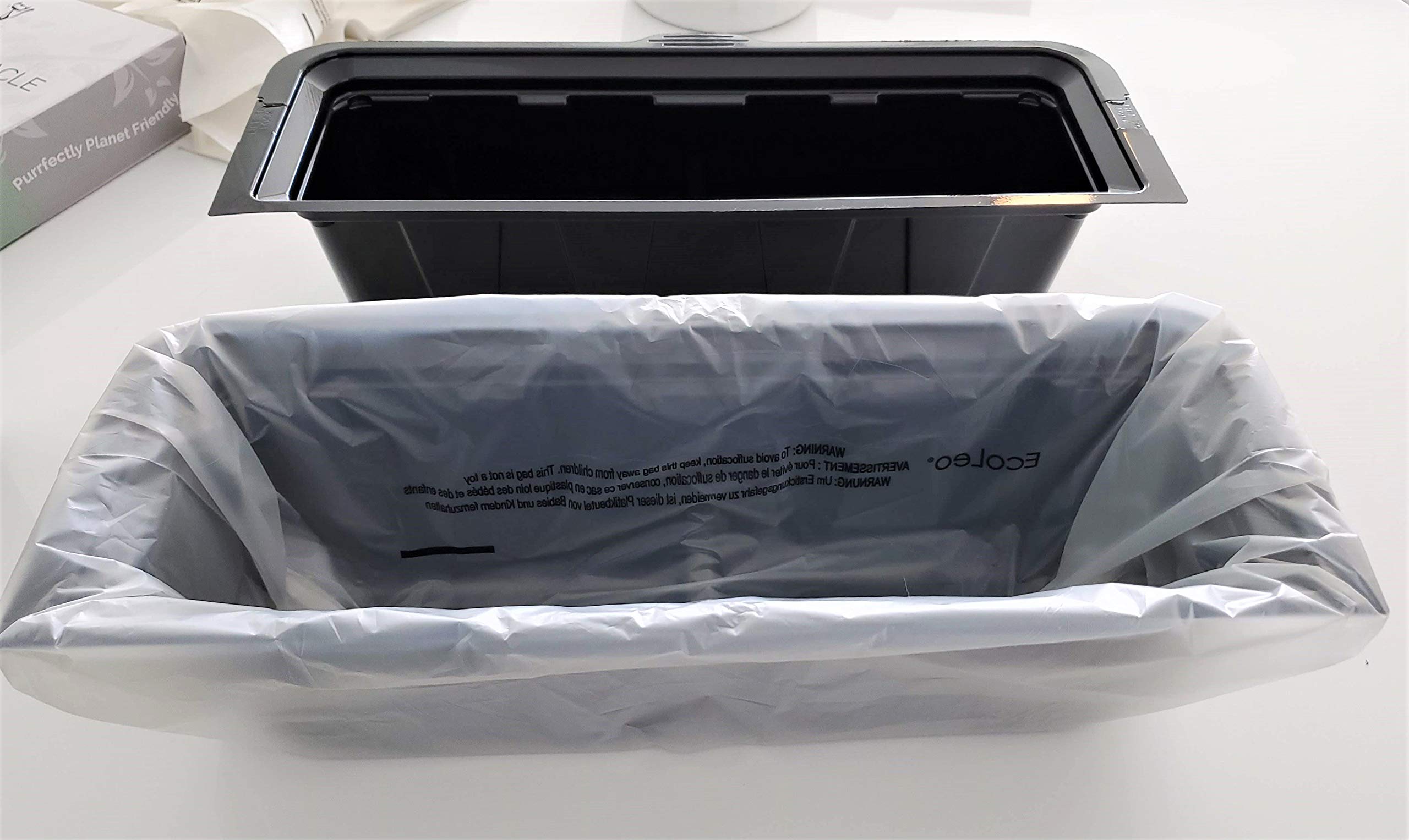 Edges folded over the receptacle for secure disposal.