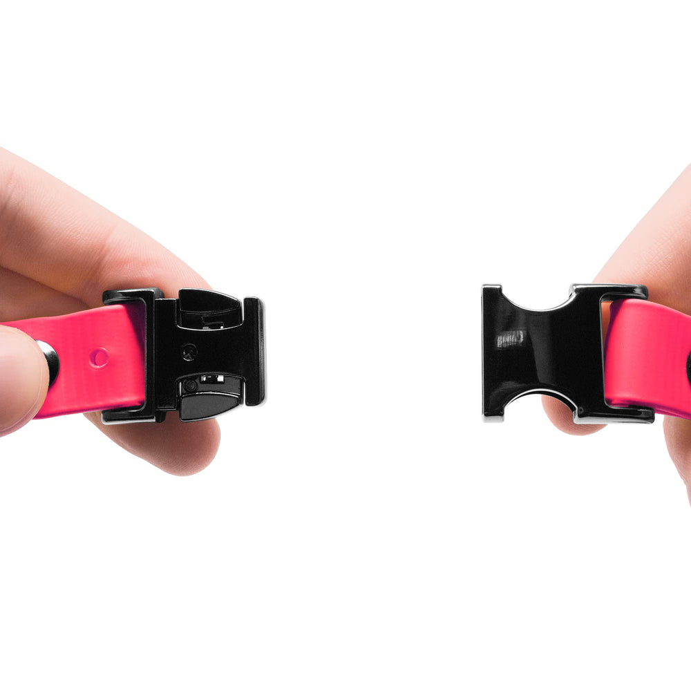 Educator D-ring and ID tag attachment on pink collar for essentials.