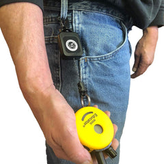 Educator Gear Keeper in-use image showing device attached to a belt loop
