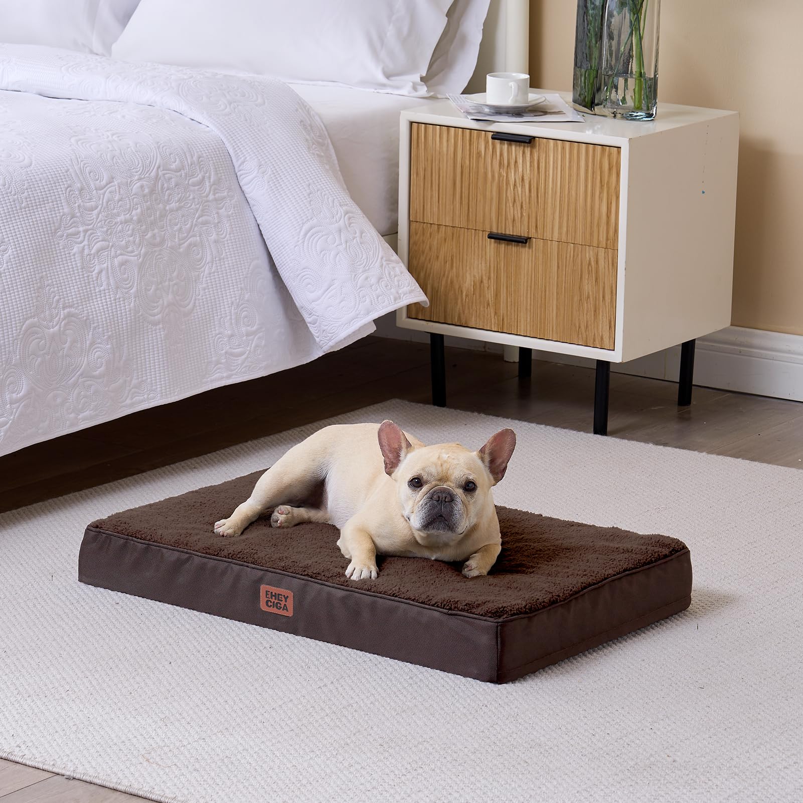 Bed fits crates and floor spaces, ideal for small dogs