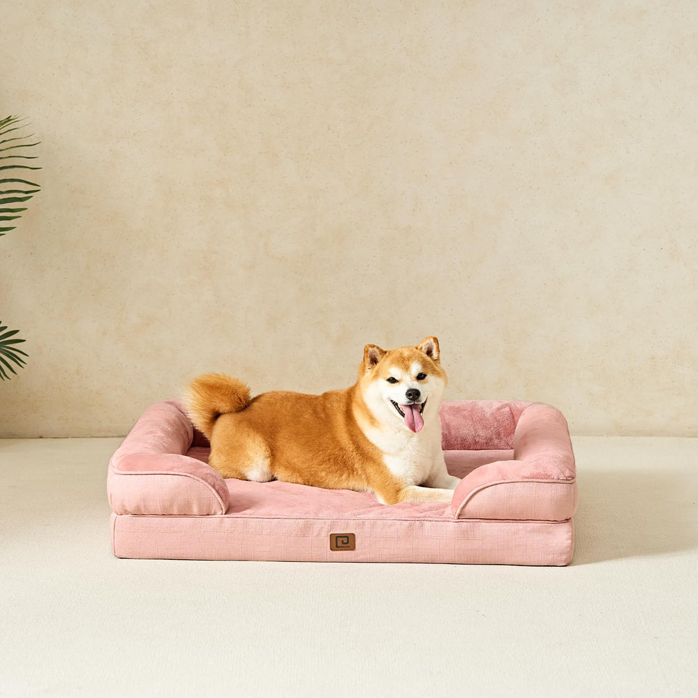 Dusty pink fabric bed in a cozy home setting