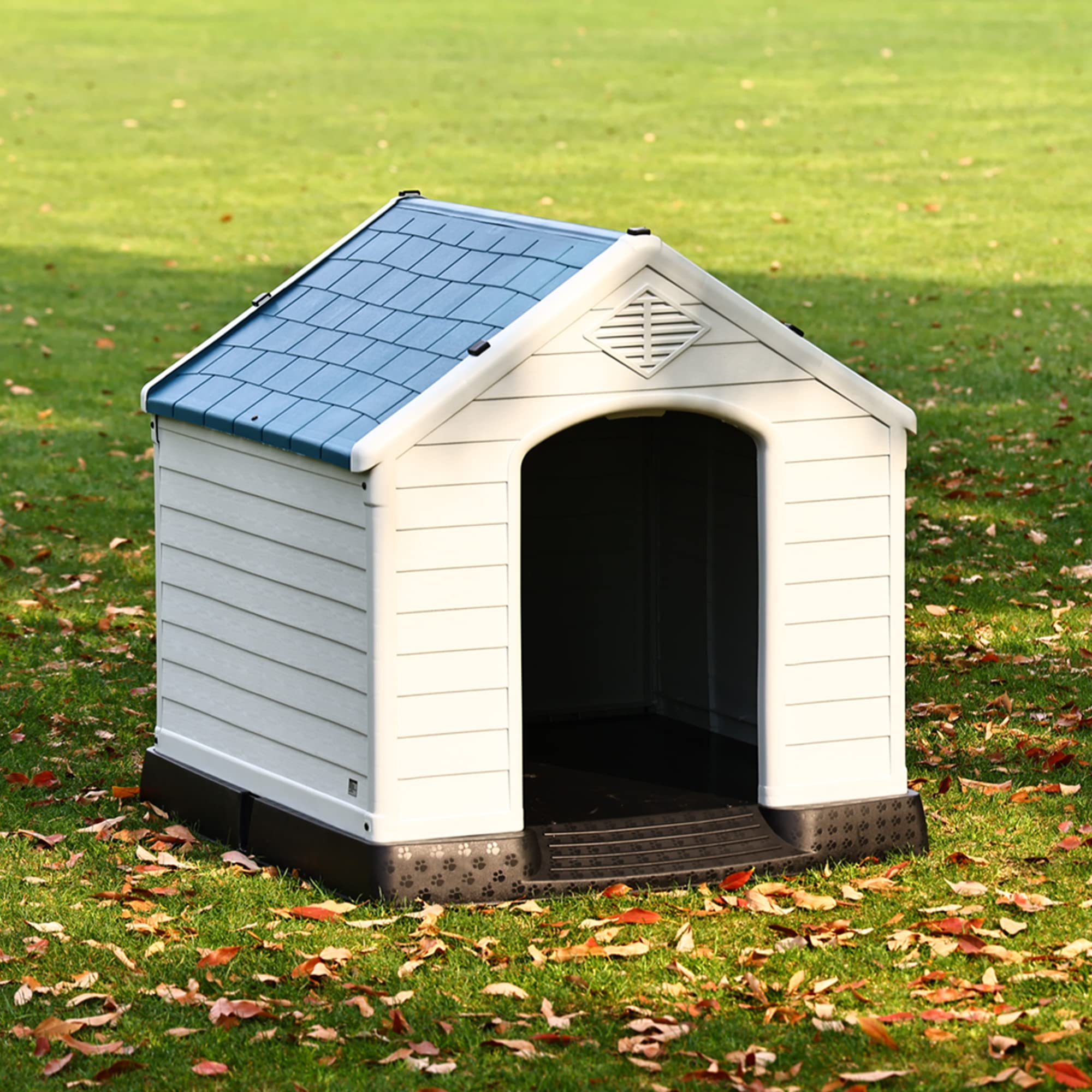 Elevon plastic dog house exterior front highlights easy assembly.