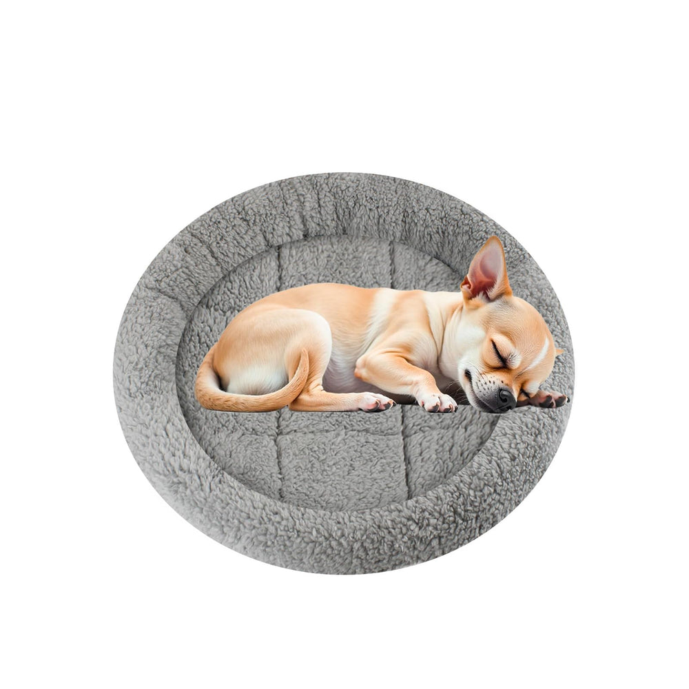 Enjoying Plush Cat Bed Mat: round design offers cozy sleep for small pets.