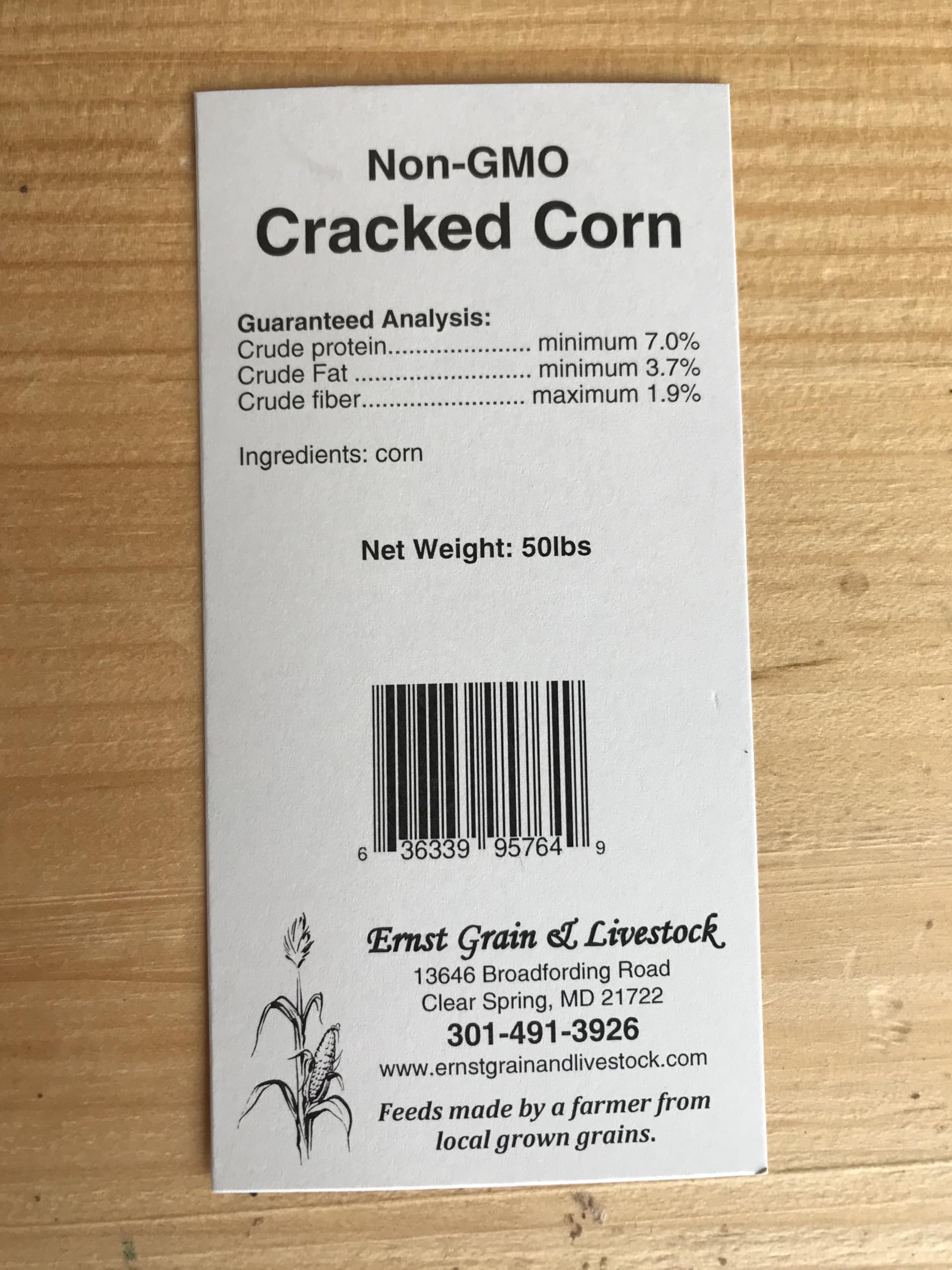 Ernst Grain cracked corn feeding ducks near water
