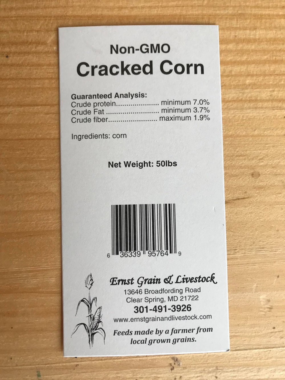 Ernst Grain cracked corn feeding ducks near water