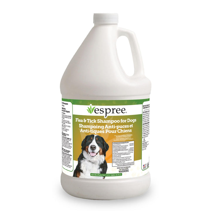 Espree Flea & Tick Shampoo bottle pour for pest protection during grooming.