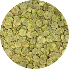 Exotic Nutrition Green Pea Flakes texture closeup showing crisp, crunchy pieces.
